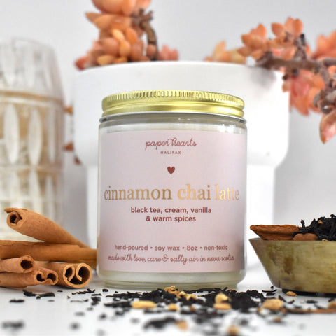 Cinnamon chai latte candle in a jar scented like black tea, cream, vanilla, and warm spices. 